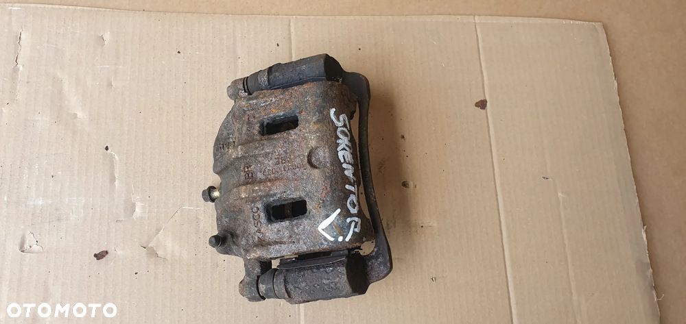 Zacisk hamulcowy lewy przód Kia Sorento I 2.5 CRDI - 1