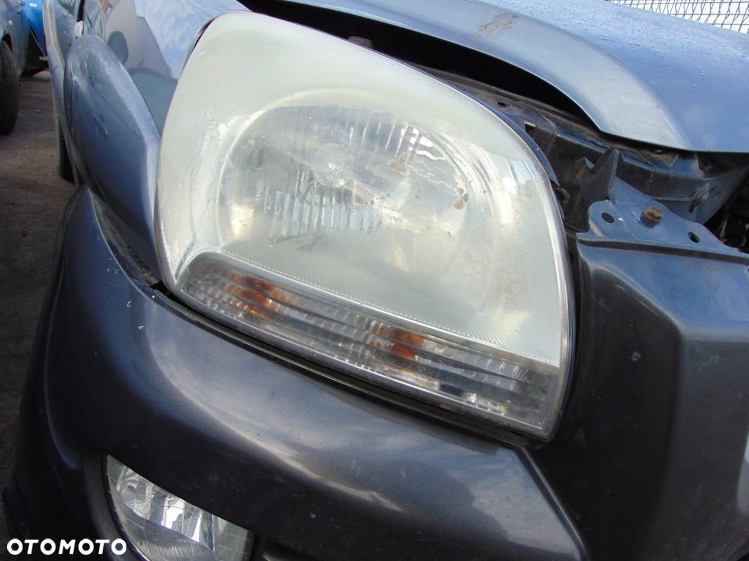 LAMPA PRAWA PRZÓD KIA SPORTAGE II EUROPA - 1