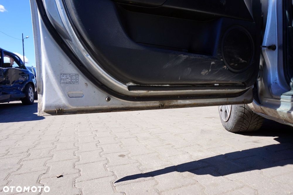 DRZWI PRZEDNIE LEWE 3 I BK SEDAN 22V  SREBRNY MAZDA 2003-2006 - 10