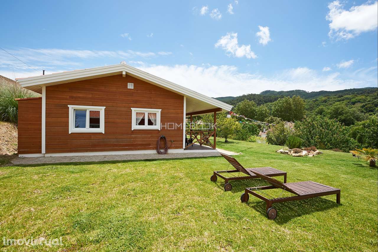 Casa com dois quartos e jardim - Grande imagem: 3/27