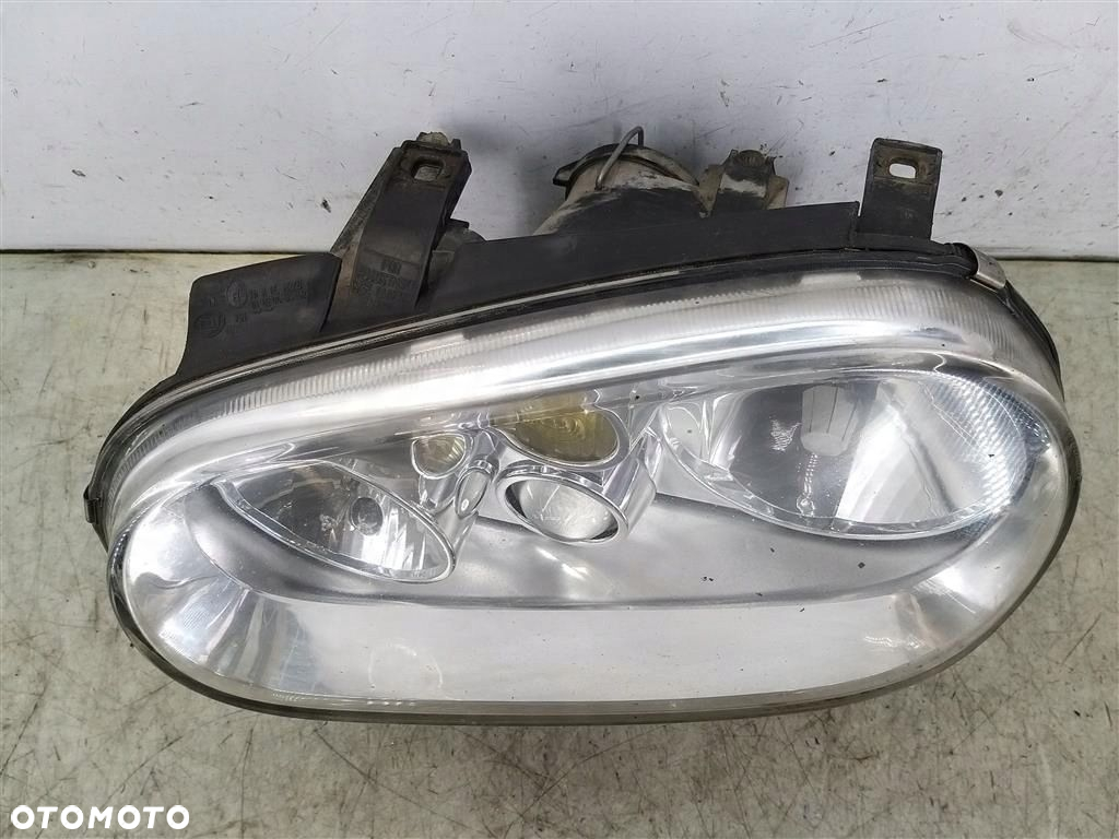 Reflektor lampa przód lewa VW Golf IV 1997-2003 HELLA 150145-00 - 2