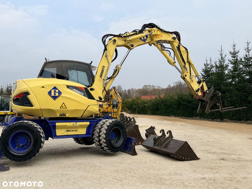 Mecalac Koparka 14 ton MECALAC 15 MWR koparko-ładowarka 3 łyżki widły 1 wł Centr.smarowanie Opony na BLIŹNIAKU 80%Camso ładowarka 714 12MTX 4x4 skrętne KLIMA kabina Premium silnik 146KM volvo EW140B DEUTZ szybka 35km/h - 24