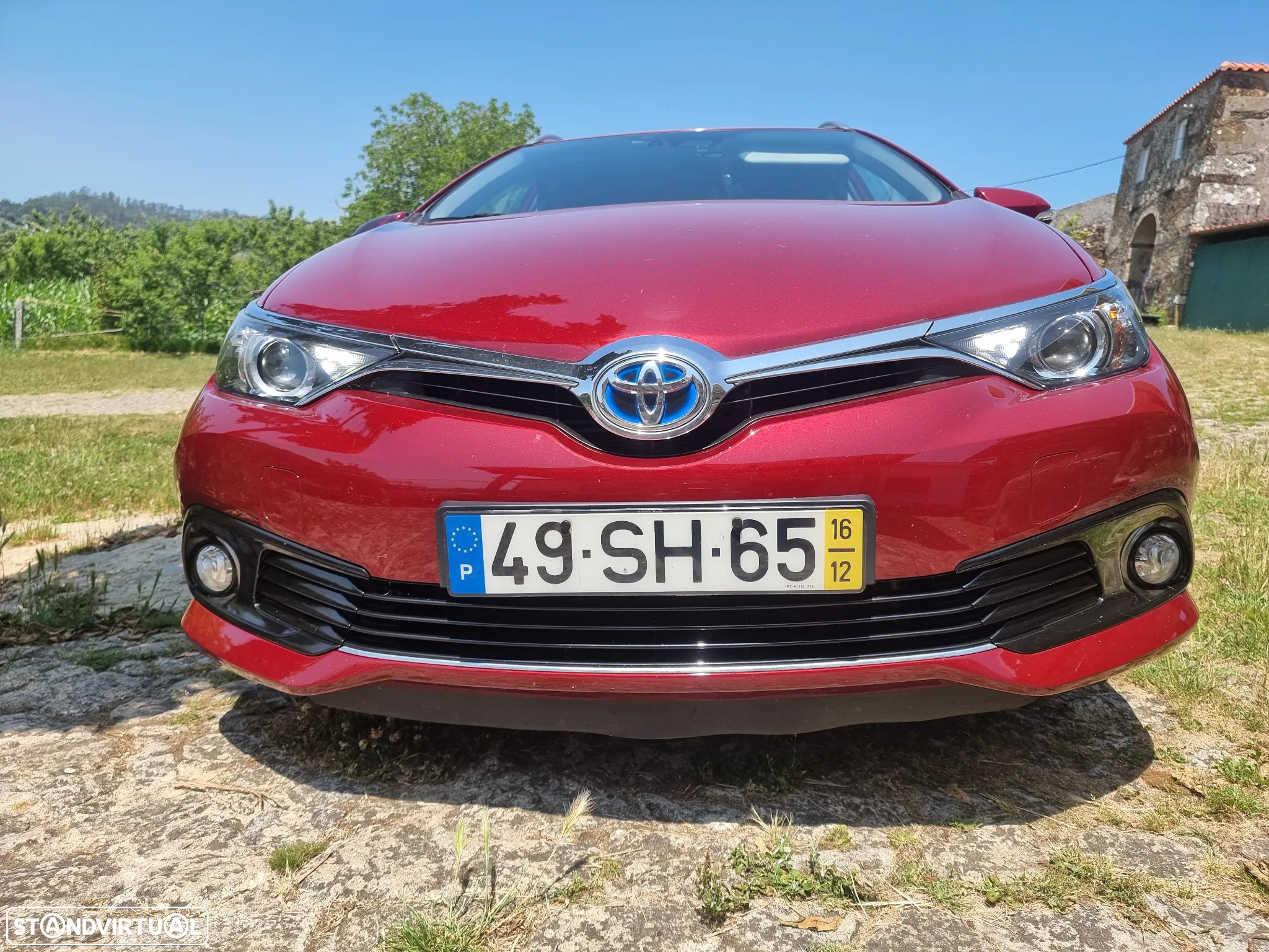 Toyota Auris Touring Sports 1.8 HSD Comfort +P.Techno+P.Sport - 16