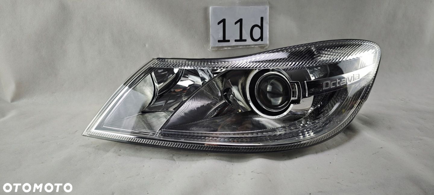SKODA OCTAVIA II LIFT XENON SKRĘTNY LEWY REFLEKTOR LAMPA LEWA 1Z1941015G - 2