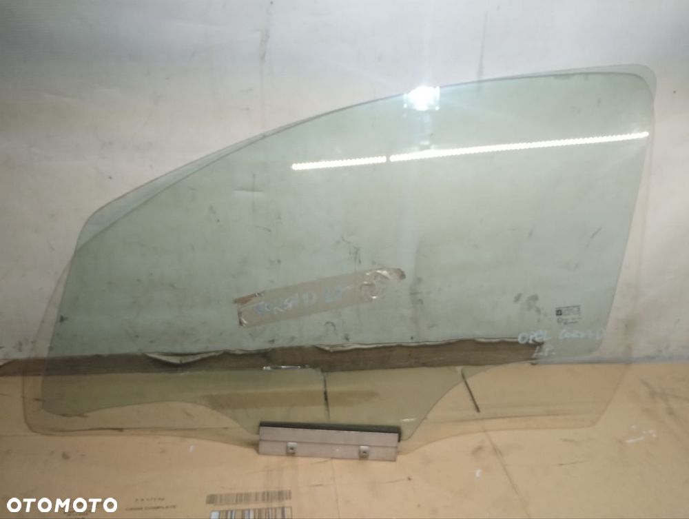 SZYBA BOCZNA LEWA PRZEDNIA DRZWI OPEL CORSA D 1.0 - 4