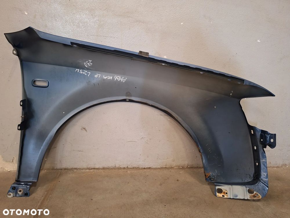 BŁOTNIK LEWY PRZÓD PRZEDNI AUDI A4 B6 LAK: LZ5W NR230 - 15