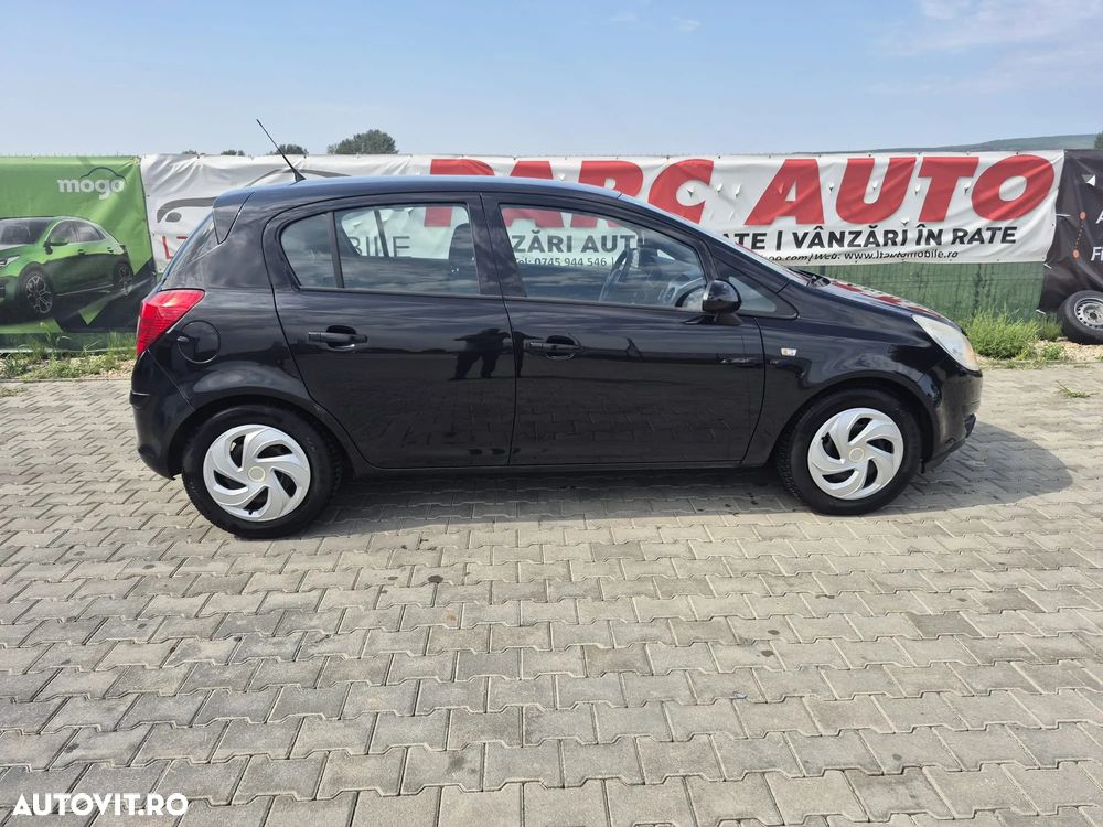 Opel Corsa 1.2i Cosmo - 13