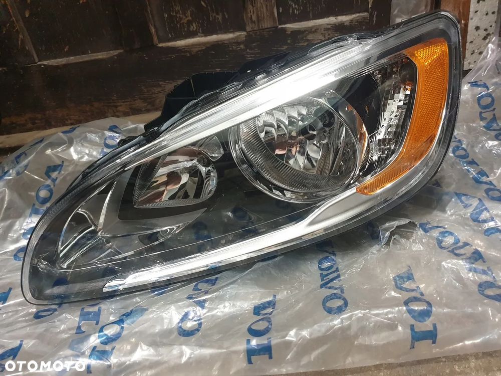 VOLVO S60 V60 LIFT 14-18 USA reflektor lampa przód lewa NEW ORYG.