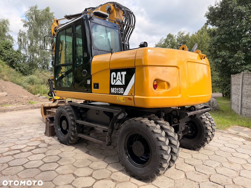 Caterpillar M313D - 4