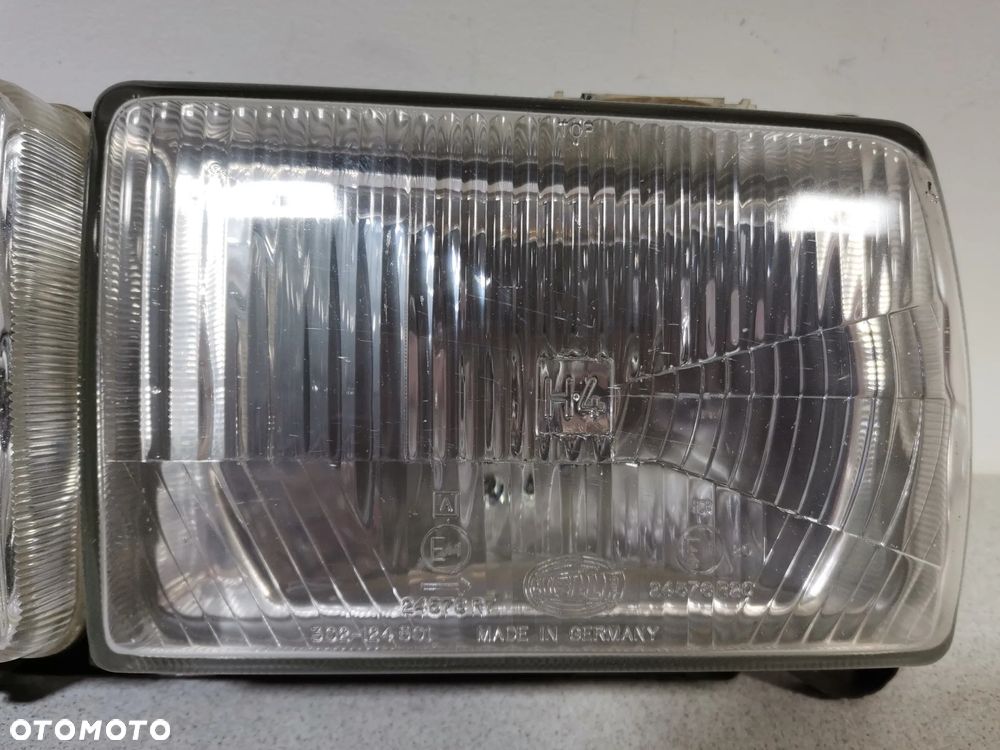Lampa Reflektor LEWY VOLKSWAGEN PASSAT B2 80-88 HELLA Oryginał - 2