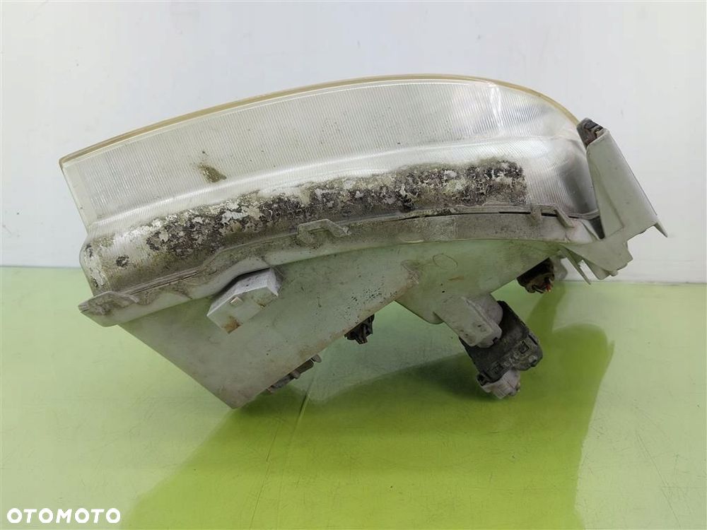 Reflektor lampa przód lewa Toyota Corolla Verso I 2001-2004 UPM60GF20 - 8