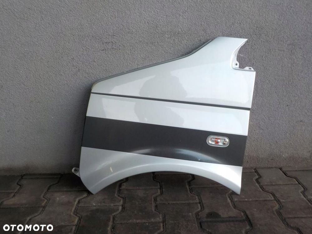 VW T5 BŁOTNIK LEWY PRZÓD PRZEDNI - 1