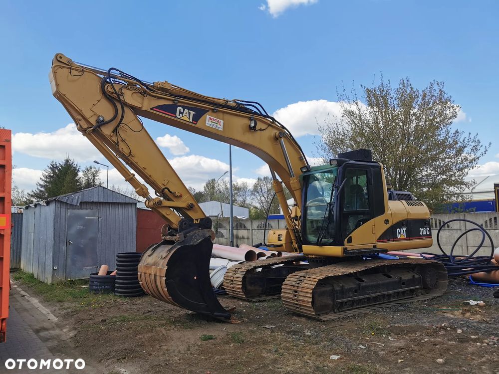 Caterpillar 318C - 11