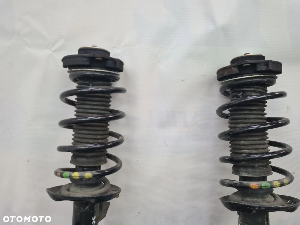 VW PASSAT B7 1.6 MCPERSON ZWROTNICA 1K0 LEWA PRAWA 3C0413031AT - 2