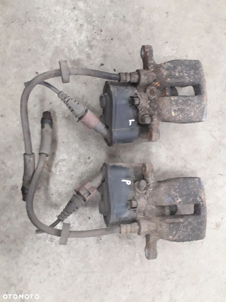 zacisk hamulcowy tył lewy prawy A6 C6 - 1