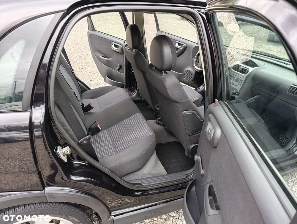 Opel Corsa 1.2 16V Cosmo - 10
