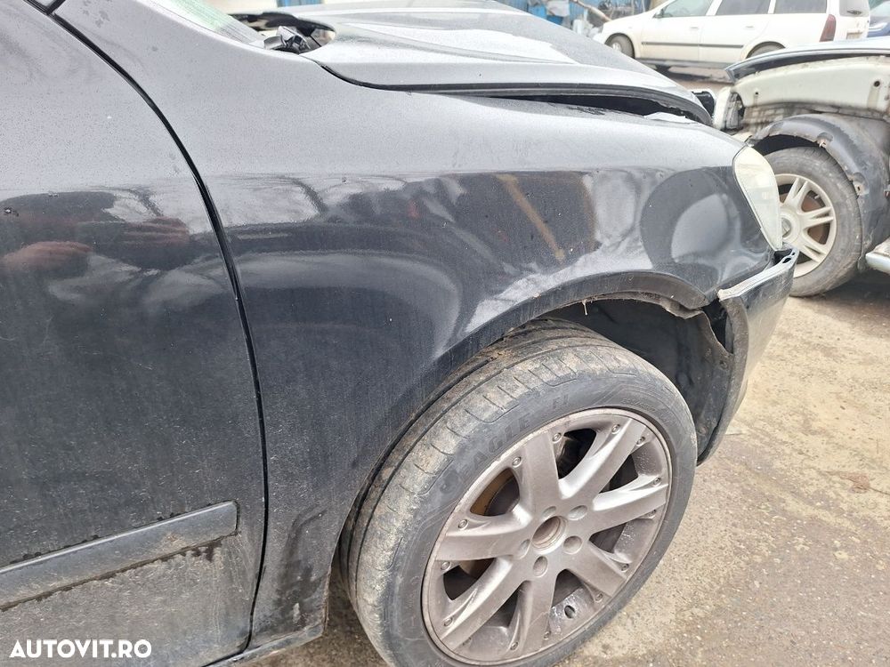 Aripa fata stanga SKODA OCTAVIA 2 Facelift 2009 - 2013 negru LF9R - 2