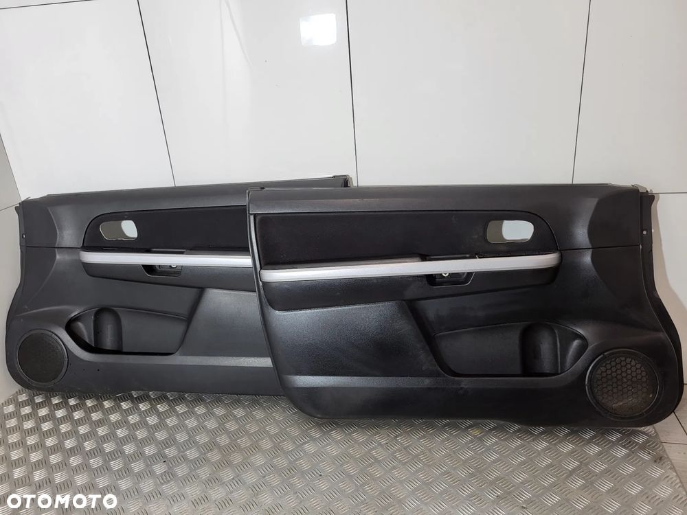 Suzuki Grand Vitara II Tapicerka Boczek Drzwi 3D - 1