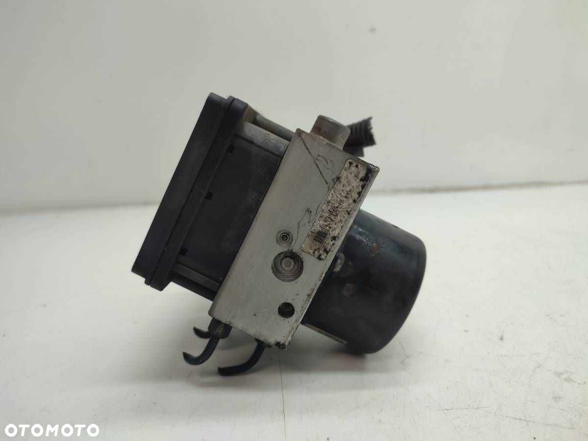 POMPA HAMULCOWA ABS NISSAN NAVARA III D40 2.5 DCI 47660EB33A - 2