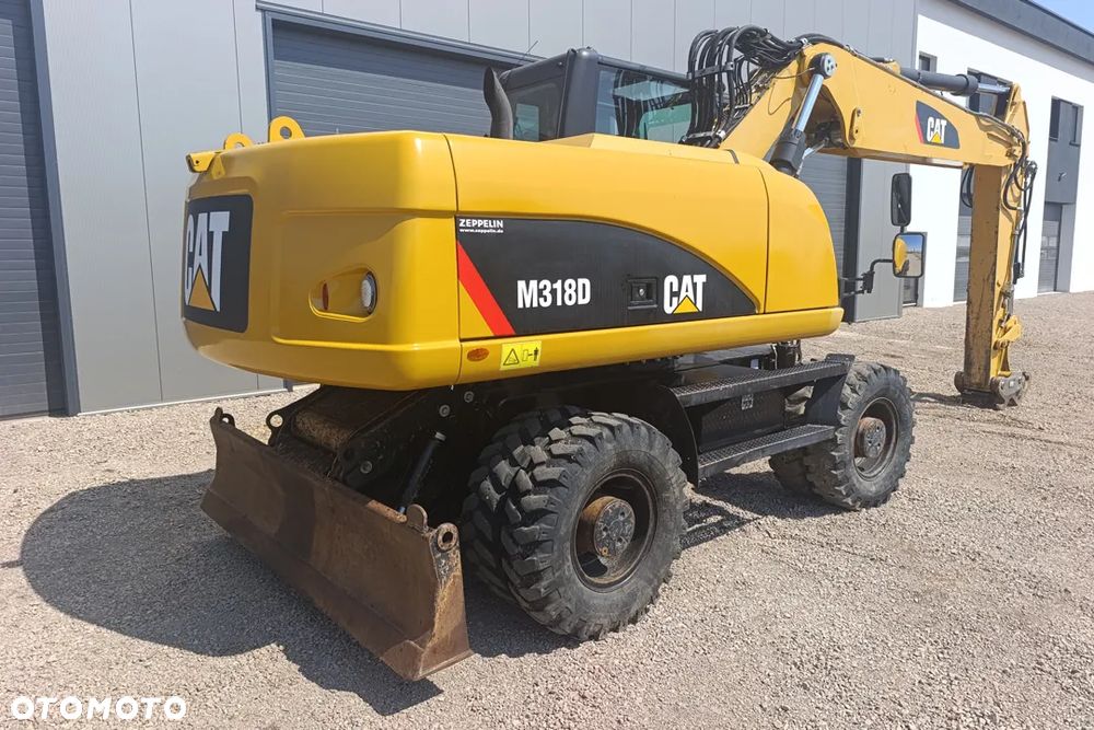 Caterpillar M318D - 4
