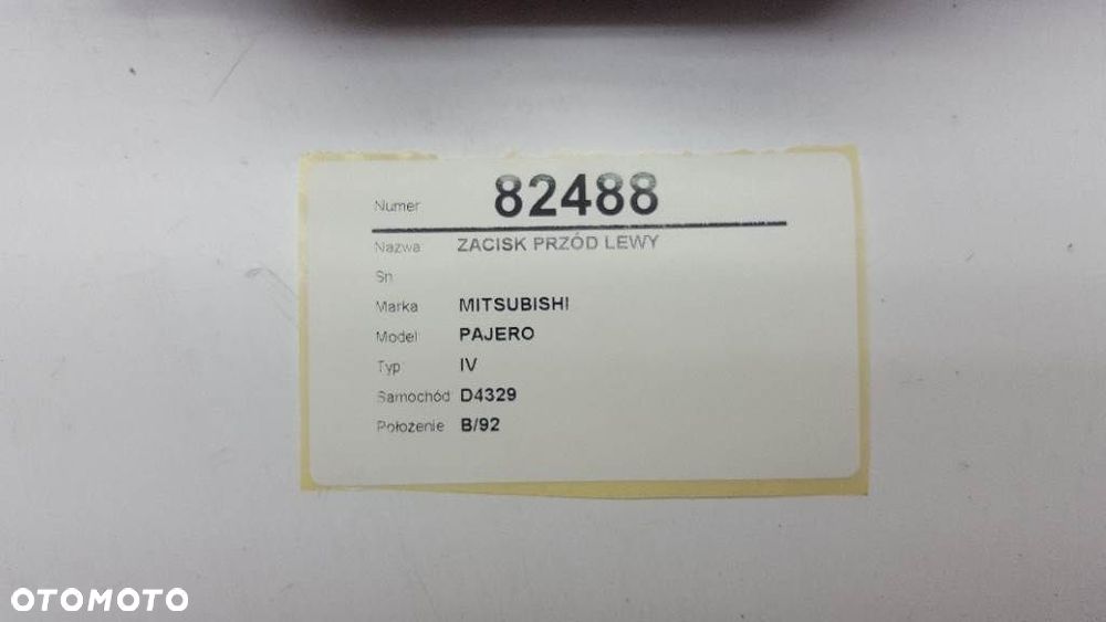 ZACISK PRZÓD LEWY MITSUBISHI PAJERO IV 2007 EU - 2