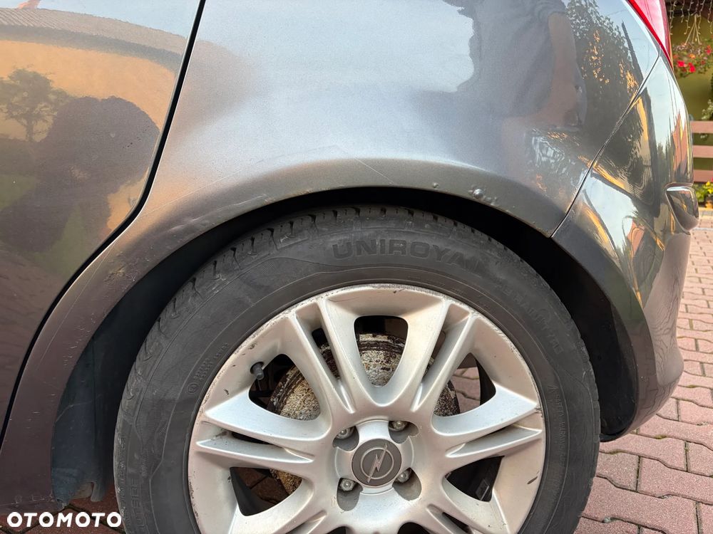 Opel Corsa 1.2 16V Enjoy - 8