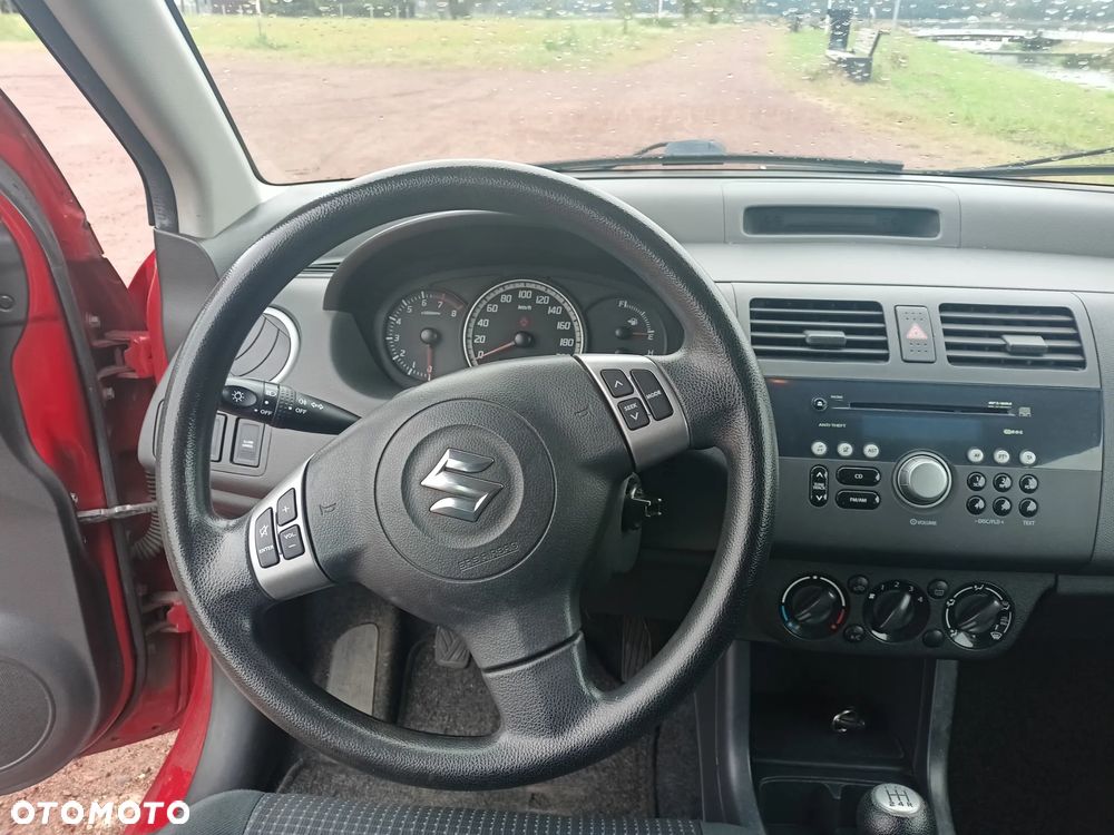 Suzuki Swift 1.3 Club - 11
