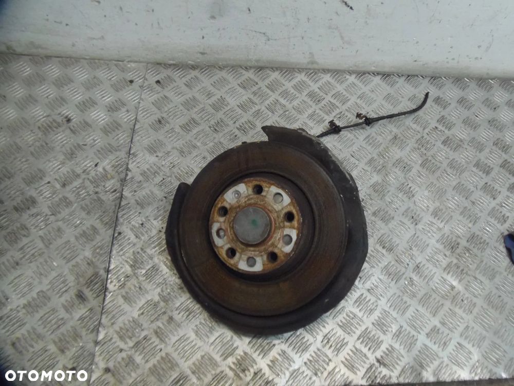PIASTA TARCZA PRAWA PRAWY TYŁ VW PASSAT B6 1,9 TDI KOMBI 06R - 1