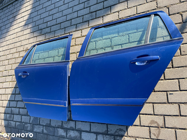 OPEL ASTRA H III DRZWI LEWE PRAWE PRZÓD TYŁ TYLNE BEZ RDZY KOMBI Z21B