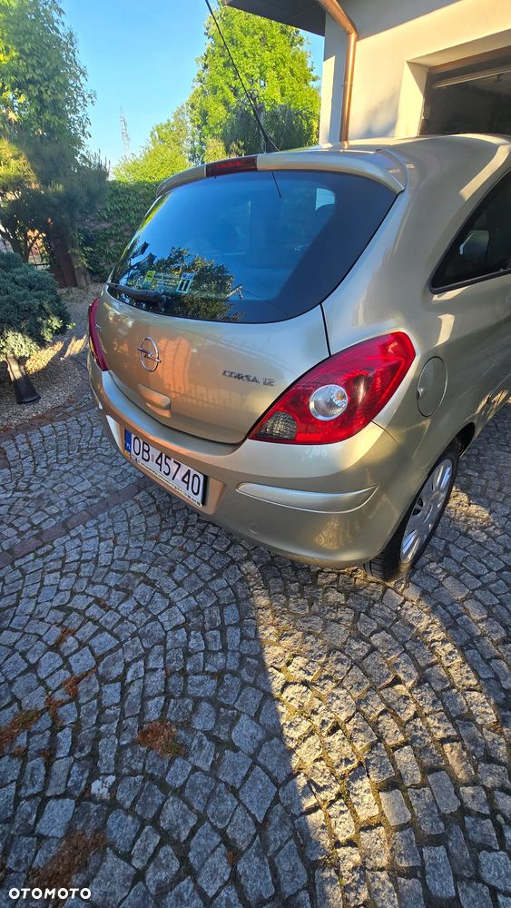 Opel Corsa 1.2 16V Cosmo - 11