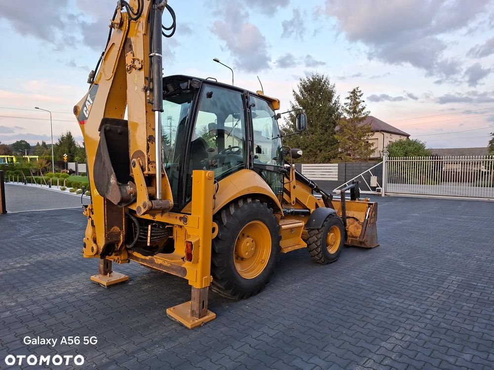 Caterpillar CAT 428E - 5