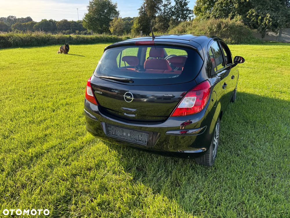 Opel Corsa 1.2 16V Cosmo - 6