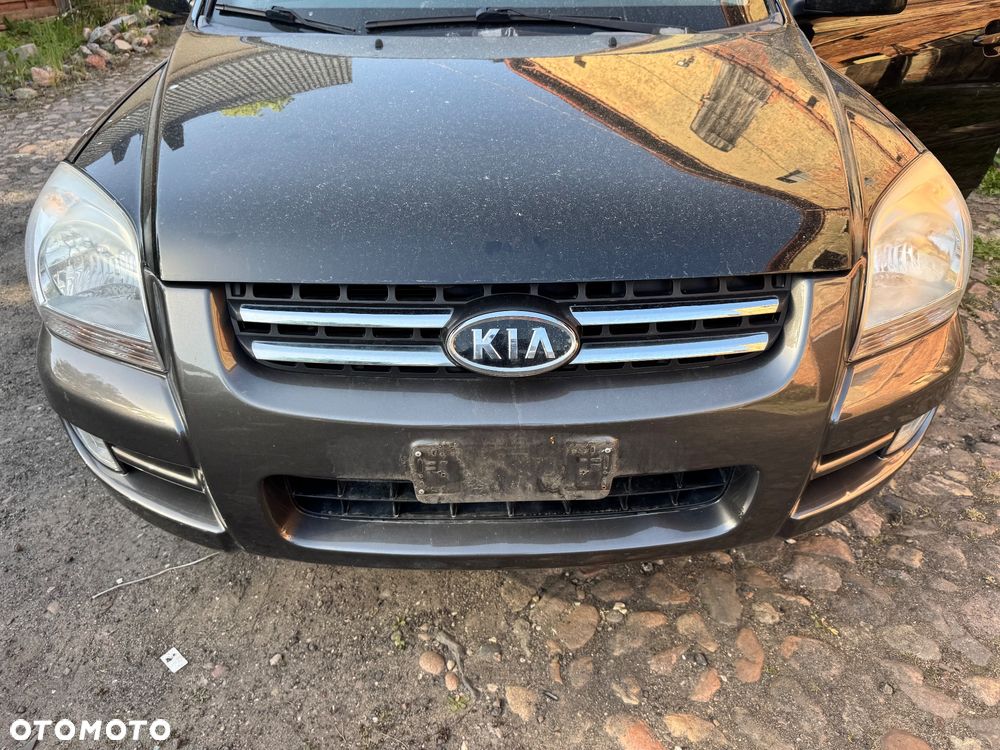Kia sportage II 04- LAMPA MASKA ZDERZAK BŁOTNIK PAS BELKA WZMOCNIENIE CHŁODNICA KOLOR 9P