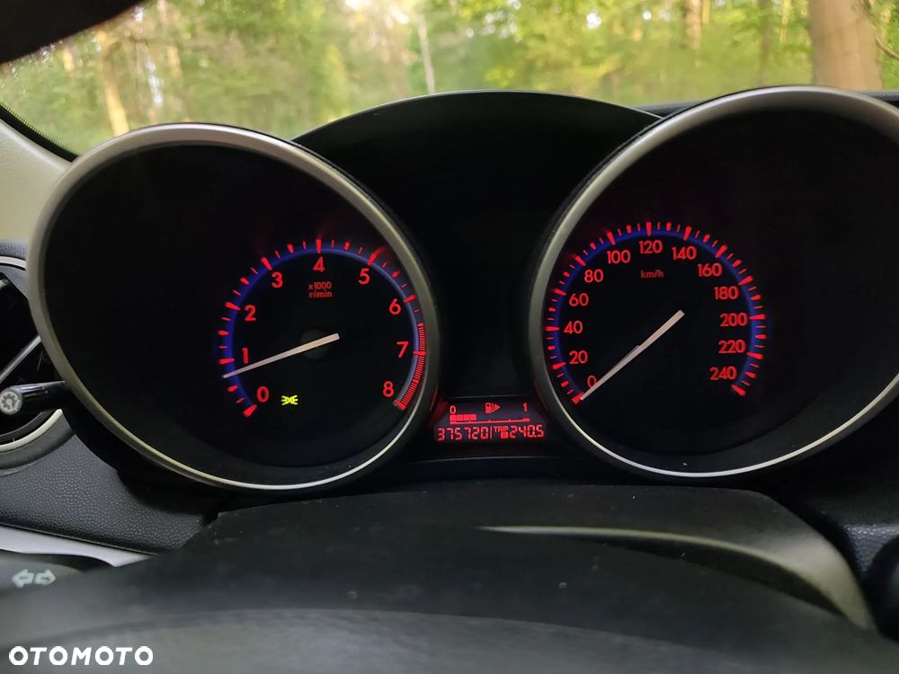 Mazda 3 2.0 Exclusive + - 9