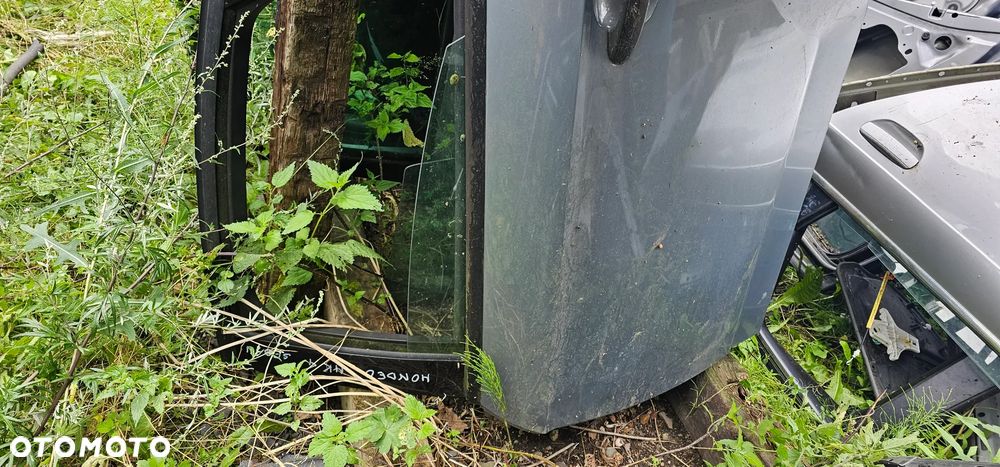 Drzwi tylne tył lewe Ford Mondeo Mk4 sedan - 2