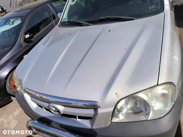 Maska pokrywa silnika Mazda Tribute I 21H