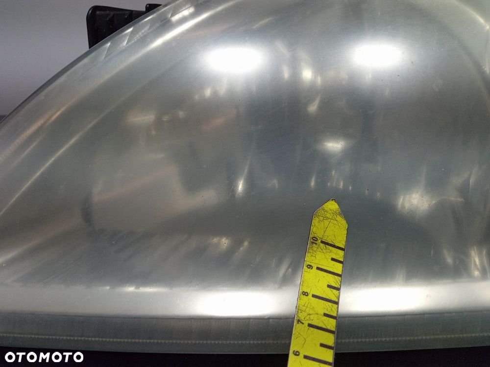 SUZUKI LIANA REFLEKTOR LEWY LAMPA PRZEDNIA EU 100-32662 - 9