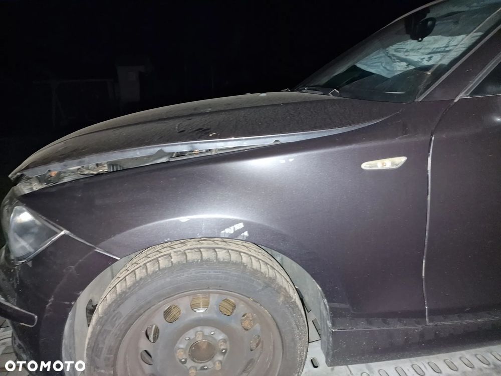 Błotnik  lewy  przód   BMW  e87  w  kolorze  A22 - 1
