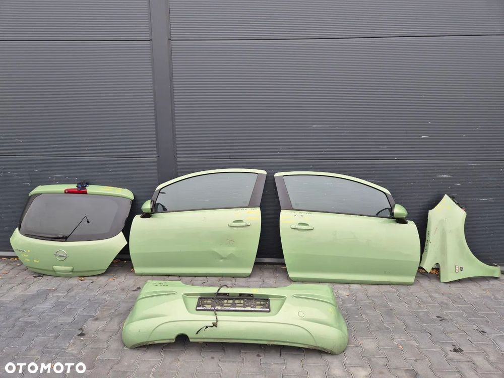 OPEL CORSA D DRZWI SZARA 3-DRZWIOWA 3D / KLAPA BAGAŻNIKA / BŁOTNIK / ZDERZAK (zielony Z30M)/ KLAPA GRAFITOWA SZARA / KLAPA ZŁOTA SZAMPAŃSKA - 3