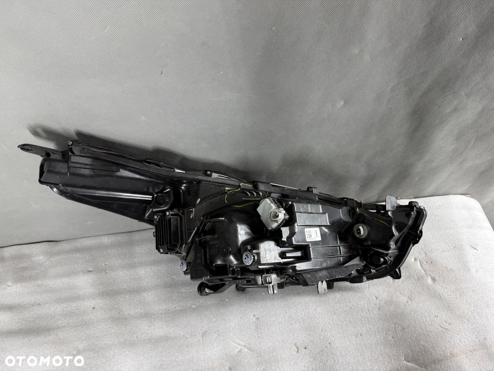 Reflektor lampa przednia lewa Toyota Highlander XU70 10100-8A06K - 7