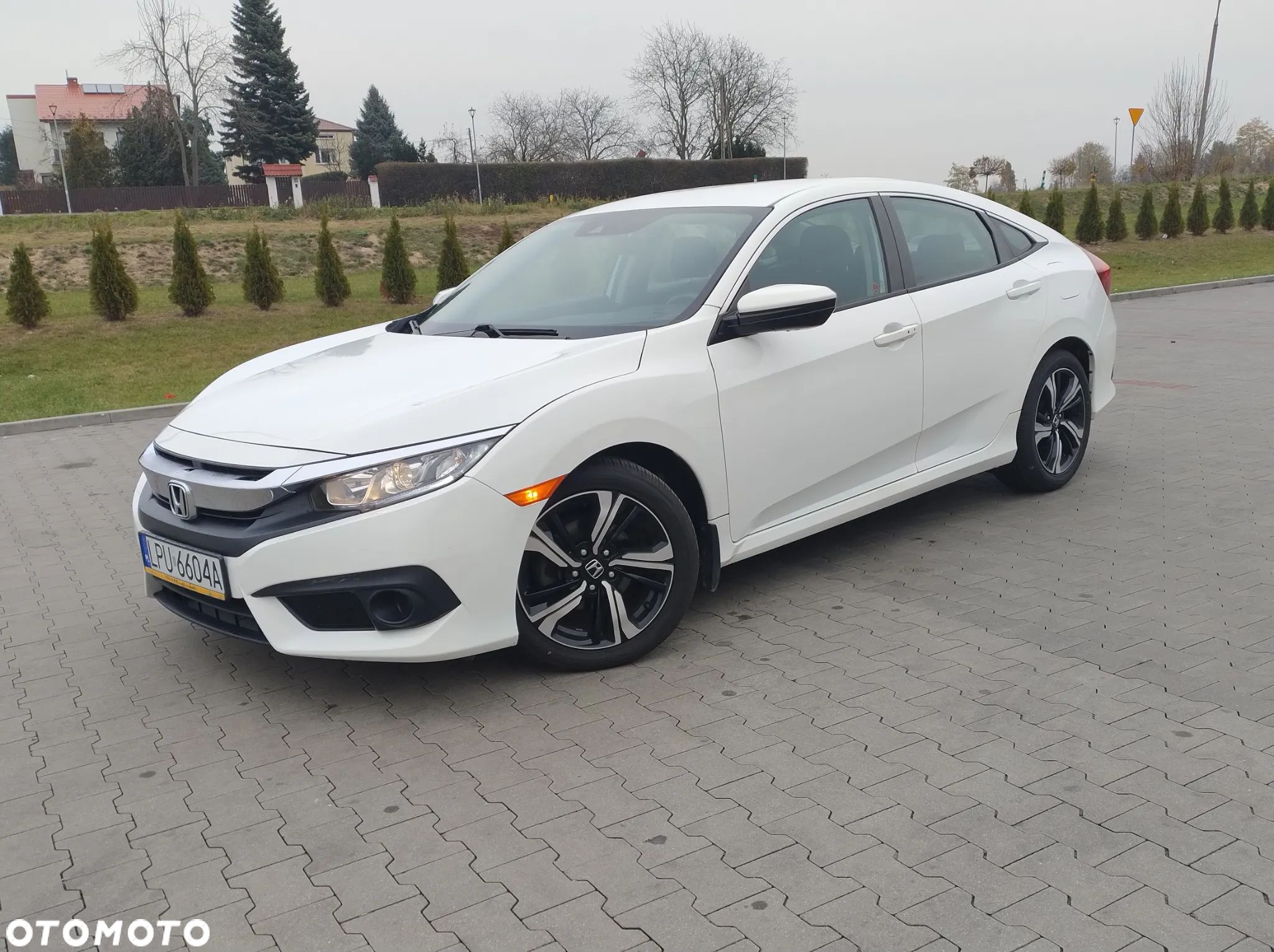Honda Civic 2.0 i-VTEC LX CVT - 1