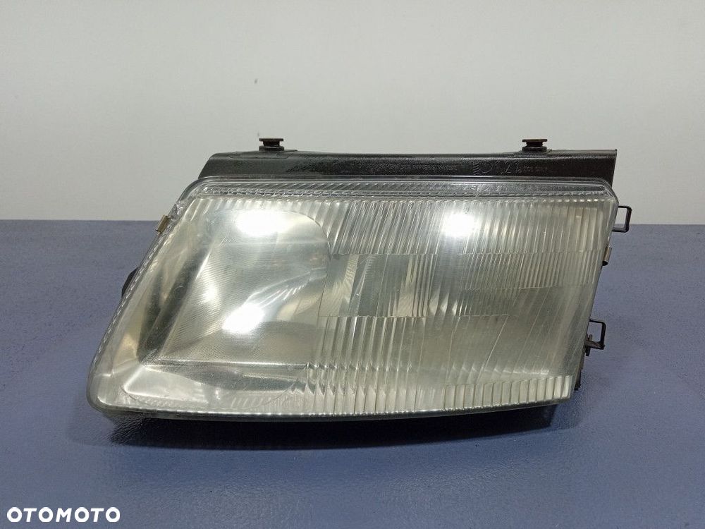 VW PASSAT B5 96-00 REFLEKTOR LEWY H7 EU 147425-00 - 1