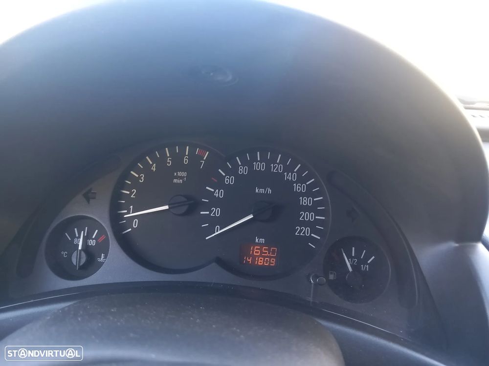Opel Corsa 1.2 16V Enjoy - 11