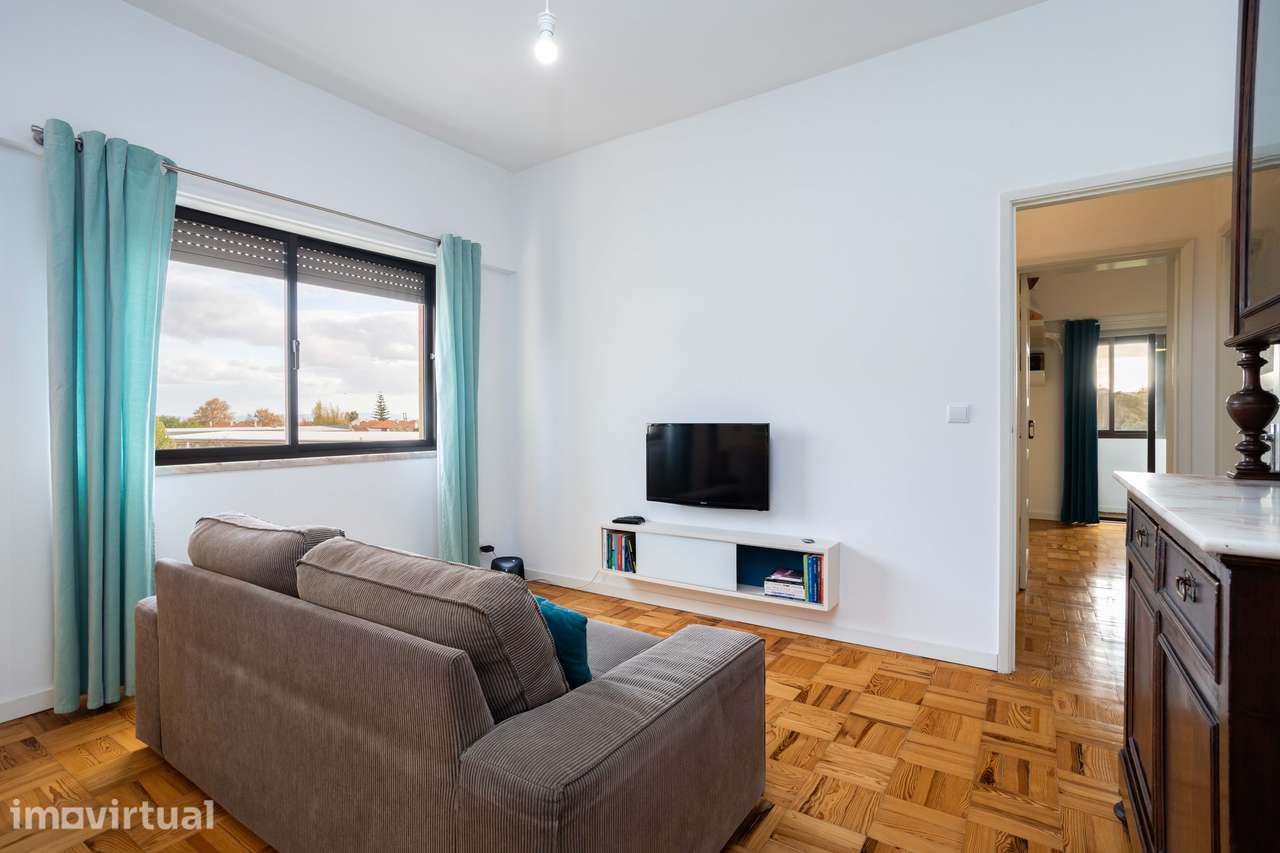 Apartamento T2 Renovado com Vista Rio no Beato: Conforto e Charme Junt - Grande imagem: 2/25