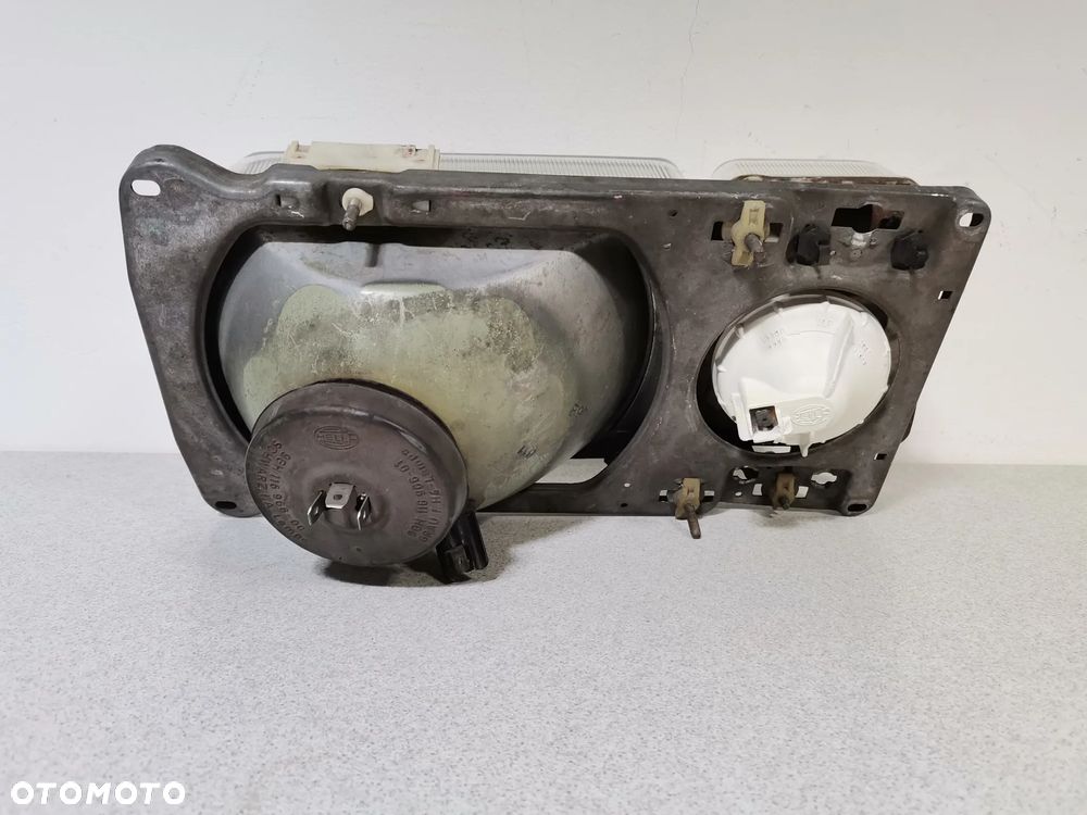 Lampa Reflektor LEWY VOLKSWAGEN PASSAT B2 80-88 HELLA Oryginał - 6