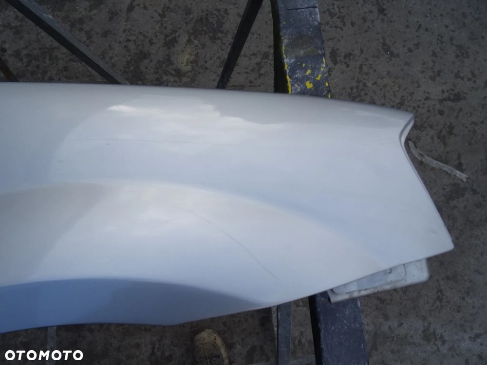 Błotnik Dacia Logan Prawy Przód - 4