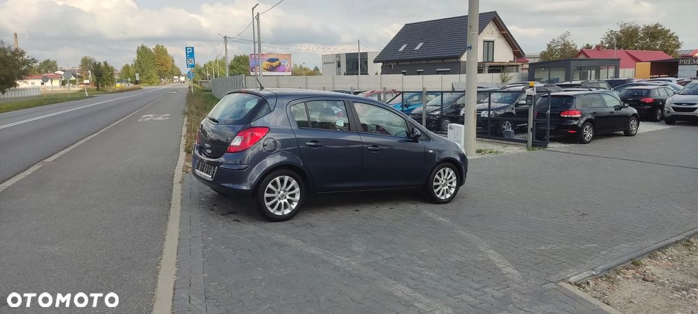 Opel Corsa 1.2 16V Cosmo - 6