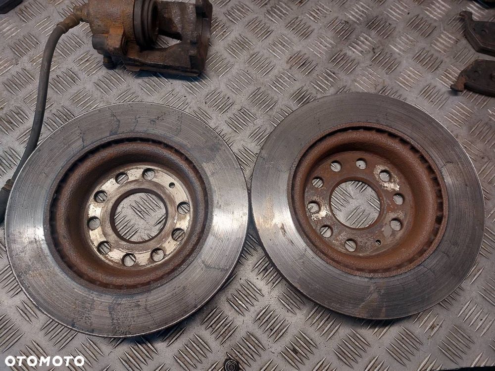 TARCZE HAMULCOWE PRZÓD + KLOCKI + ZACISKI SKODA OCTAVIA II LIFT 1.9 TDI - 8