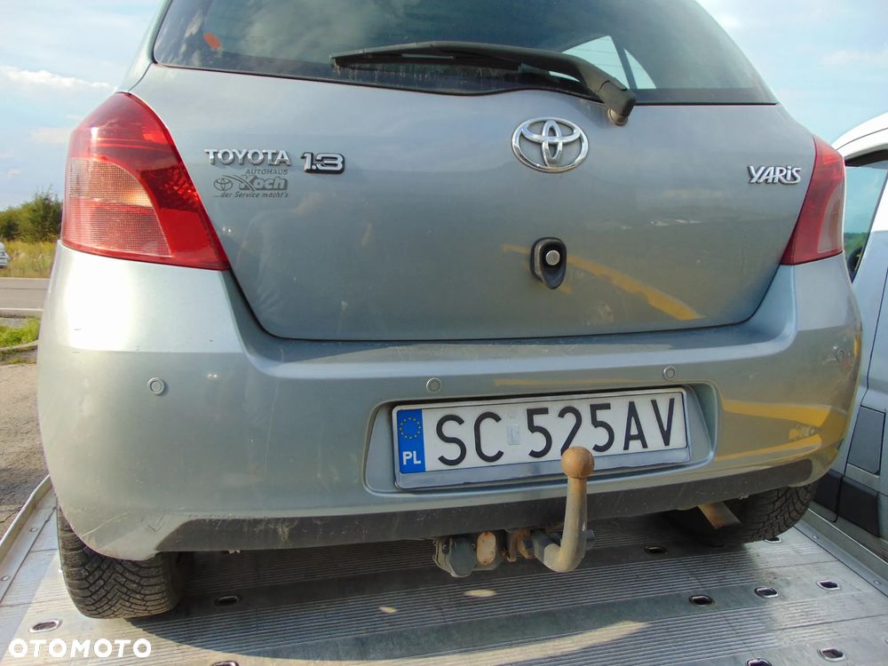 ZDERZAK TYŁ TOYOTA YARIS II 1F8 PDC - 1