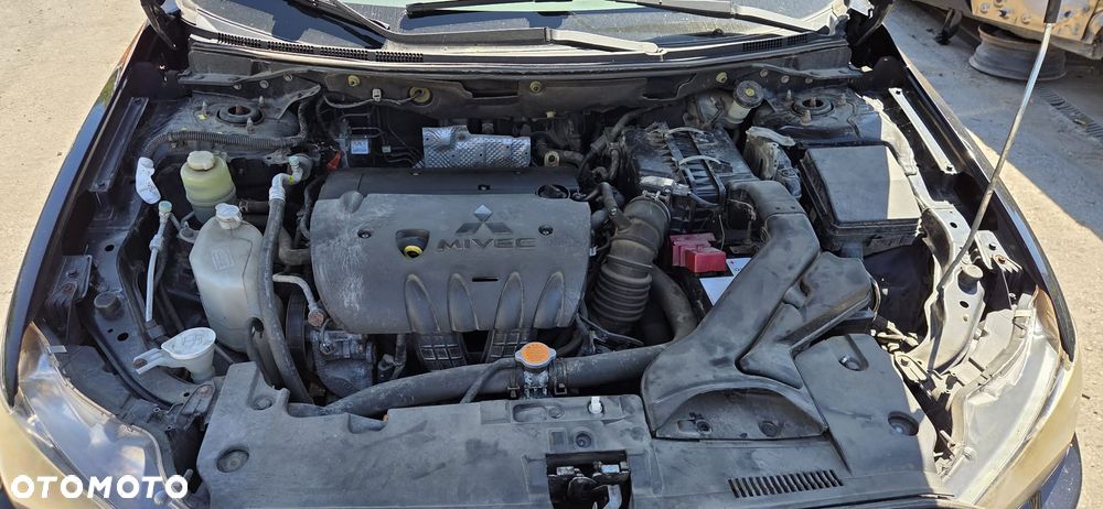 MITSUBISHI LANCER X lampa prawy przód - 4